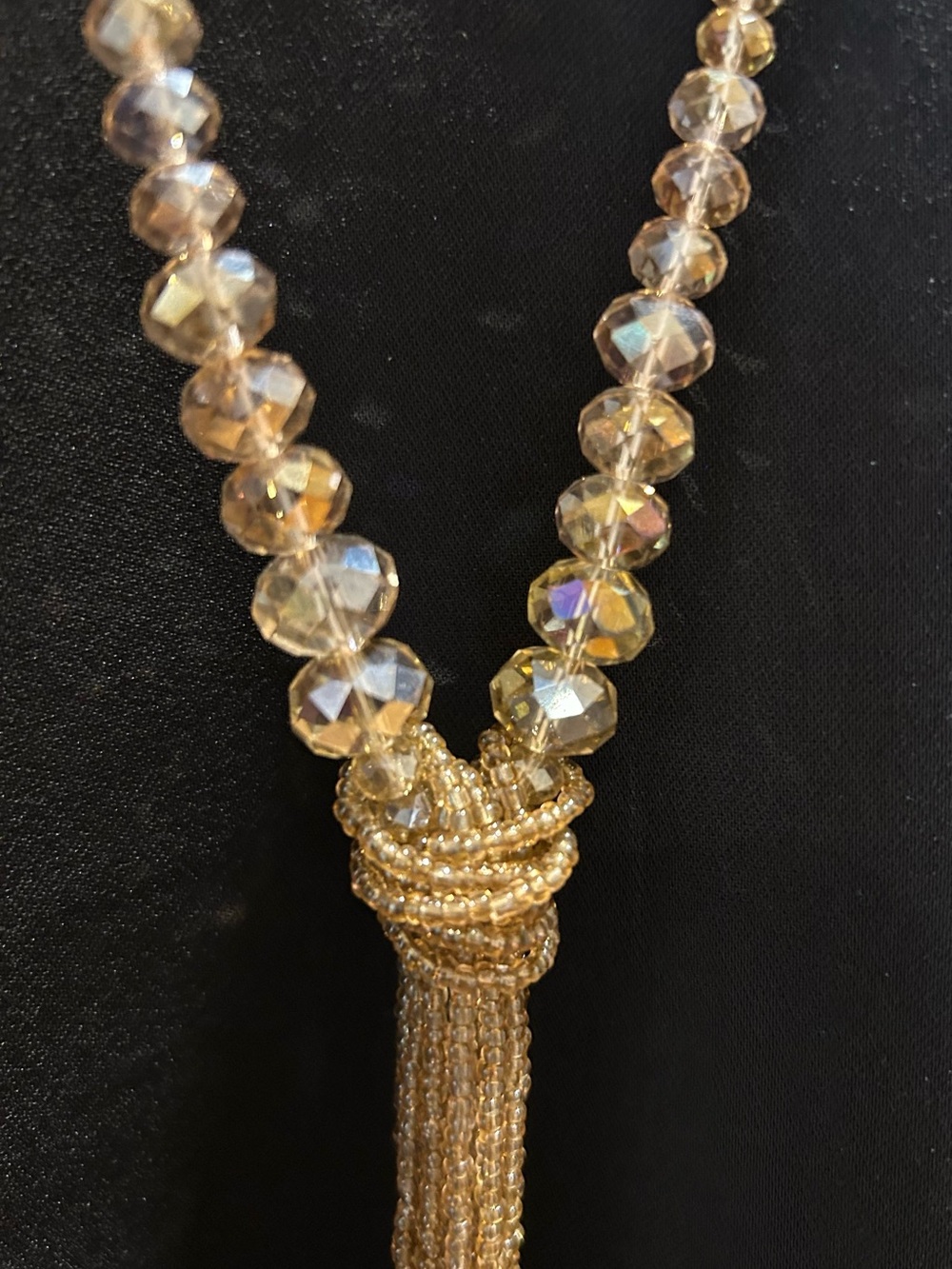 Beaded lariat necklace with multi-strand fringe tassel wrapped knot